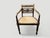 Stunning hand carved teak arm chair with beautiful patina. The front legs and arm rests are beautifully fluted and hand...