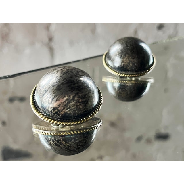 Pair of vintage Mexican sterling silver dome earrings with bronze-black metallic cabochons and twisted rope detailing....