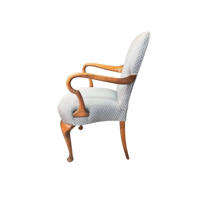 Very nice upholstered armchair in Queen Anne style. Made of walnut with the typical gooseneck armrests. Since the...