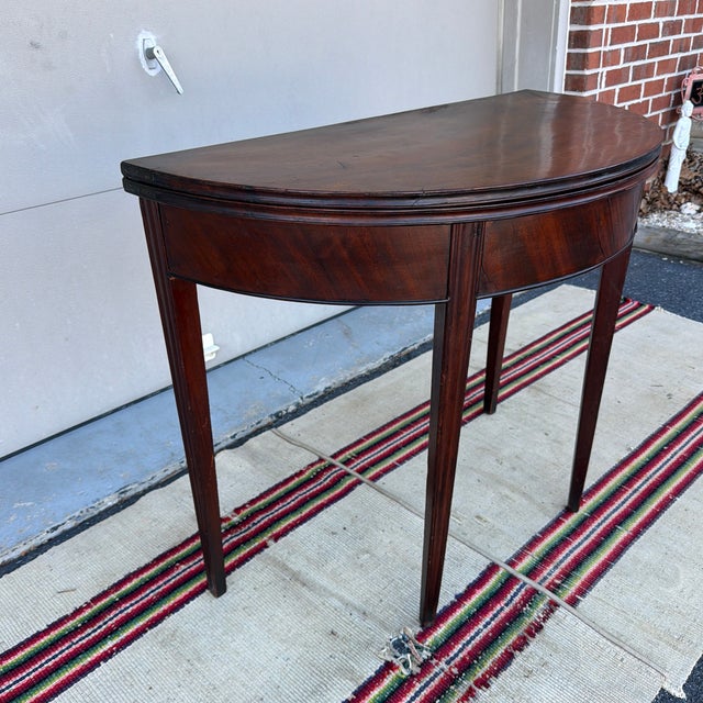 Antique Mahogany Hepplewhite Demilune Flip-Top Game Table, Philadelphia, Circa 1790s A superb and refined example of late...