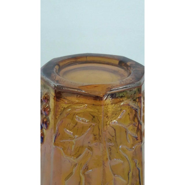 This stunning set of 8 tumbler cups is made of glass. These tumblers are made in the style of Harvest Grape by Indiana...