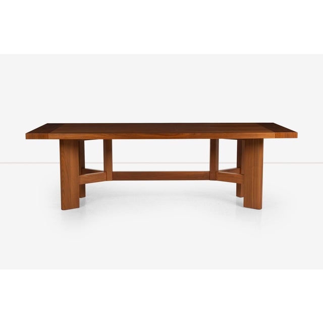 Holly Hunt Walnut Dining Table, c. 2010 Refined east-west walnut figuered grain pattern with contrasting north-south edge...