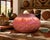 Beautiful handcrafted Native American red earth pottery vessel featuring deeply carved geometric motifs and a striking...
