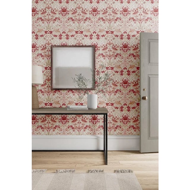 A cheeky bird pecks at delicious strawberries on this iconic Morris & Co. design repainted and engraved here for the first...