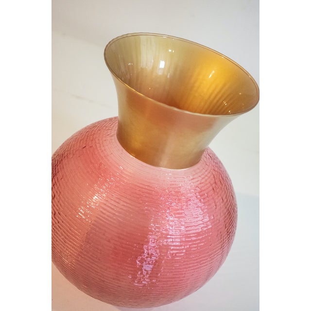 A beautiful pair of hand-crafted open vases by Venetian masters. The colors are original to the Murano tradition, in this...