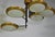 Splendid Stilnovo three-disc brass and glass ceiling lamp, Italy, 1950s. Reference: Botteghe Storiche di Milanesi, Milan,...