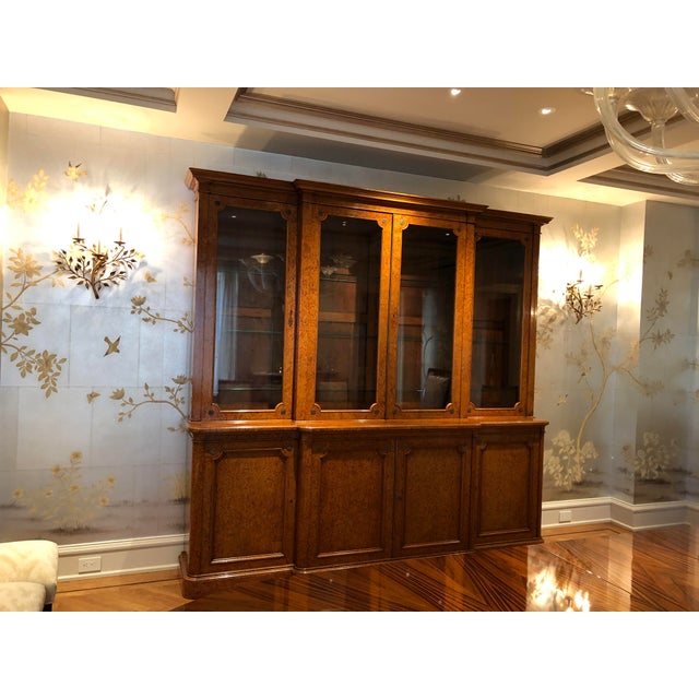 English burlwood bookcase c. 1850 with brass decorations. Signed Holland & Son Furniture maker to Queen Victoria.