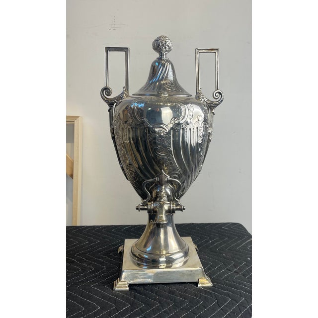 Antique Victorian silverplate samovar by the renowned English maker James Dixon & Son, dating to the late 19th century....