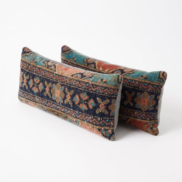 This 10'' x 36'' pillow cover set was made from authentic Turkish rug pieces — indigo ground with rose and teal star...