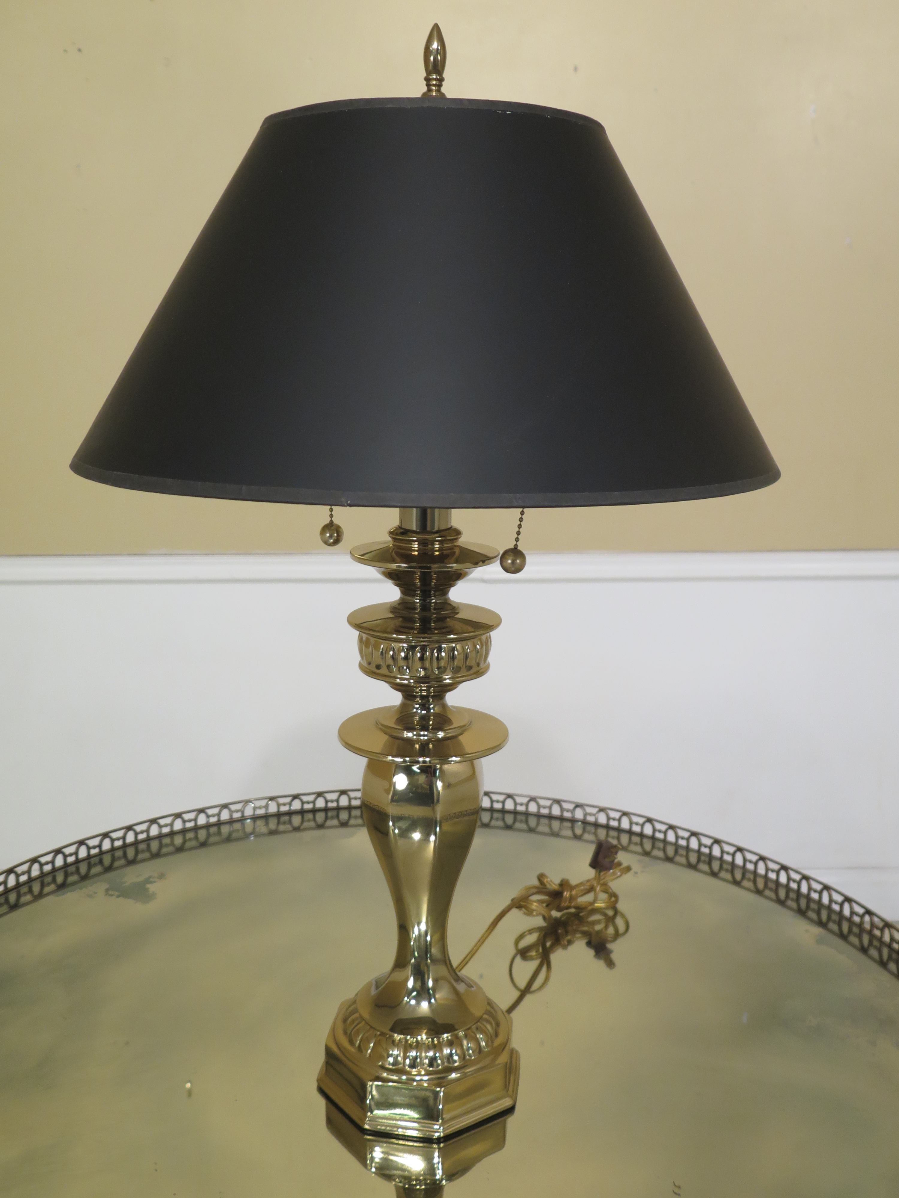 brass table lamp with black shade
