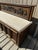 A superb 17th-century carved oak chest-bench, a testament to the craftsmanship of the artisans of that era. This piece...