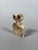 Bell-shaped "eye" idol. Tell Brak, Middle East. It has a bell-shaped body surmounted by two pierced eyes. Sculpture in...