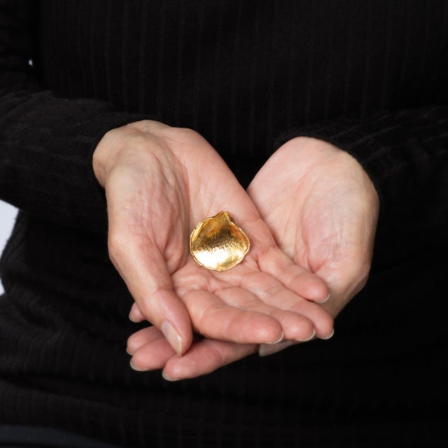 Finely detailed vintage Tiffany & Co pendant crafted in 18 karat yellow gold (circa 1979). The vintage Tiffany pendant...