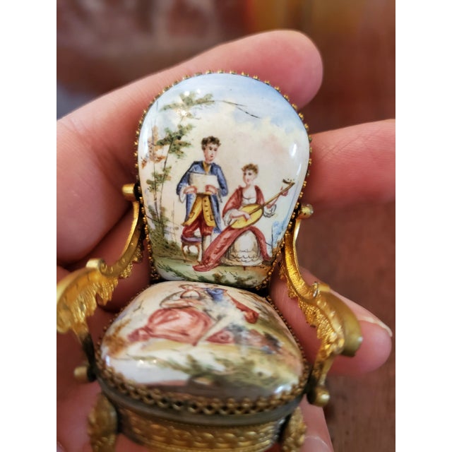 An exquisite antique over 150 years old hand painted gilded miniature enameled chair . Rich polychrome scenes depicted on...