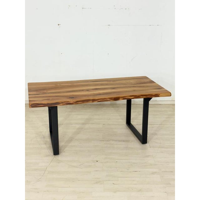 For sale is a solid walnut dining table top. The base is NOT INCLUDED. Production note: Due to the shape and grain of the...