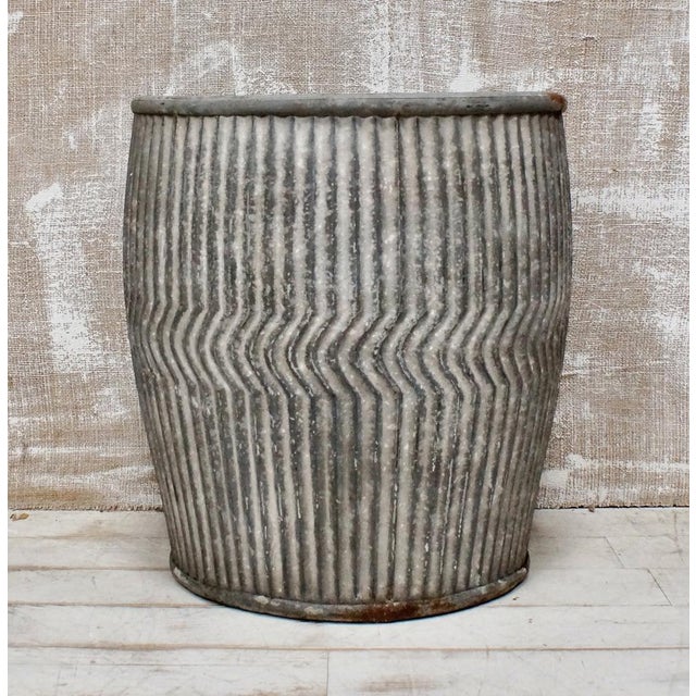 Fantastic original galvanised Dolly Tub, used as a garden pot or planter featuring a ribbed design and rolled edge top and...