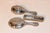 Three piece sterling silver vanity set with hallmarks for Walker and Hall, Sheffield, 1901. They are engraved with he...