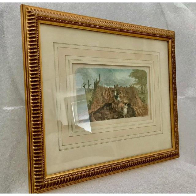 From my family’s travels in Cape Town, this artwork is a gold framed lithograph drawing of wildlife hunt. The tribal theme...