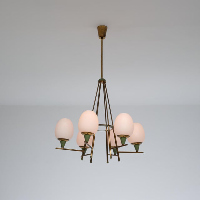 An elegant italian chandelier from the 1950s, distinguished by a sculptural, well-balanced composition and a refined use...