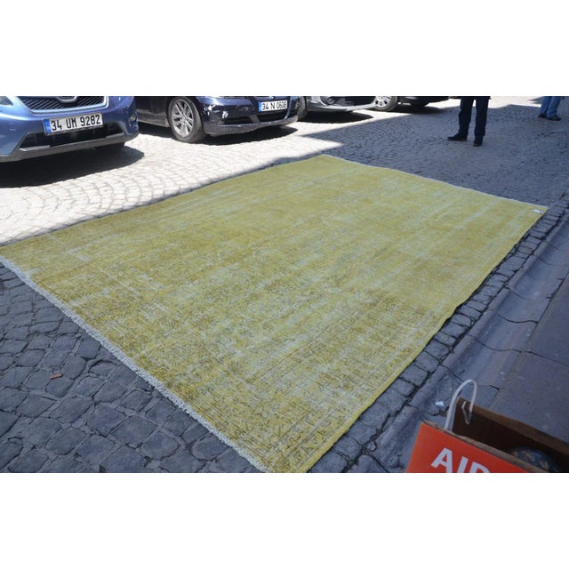 A Turkish handmade vintage Anatolian Oushak rug. We collect old vintage antique rugs from Anatolia, which is the eastern...