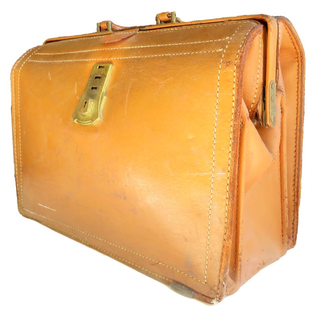 Harken back to the days of doctor's house calls with this wonderful vintage medical bag. We love this as a decorative...