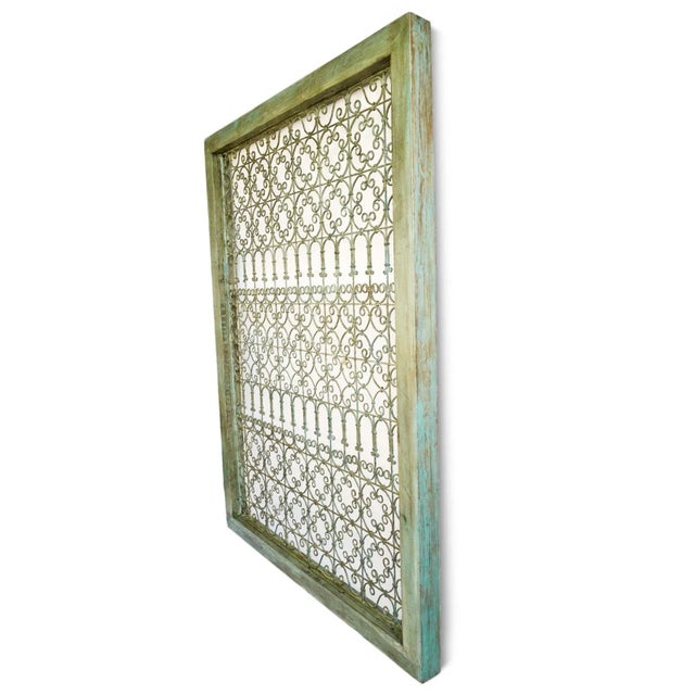Solid teak wood frame with inset hand forged stunning iron screen. Great for use indoors or out with green-blue stained...