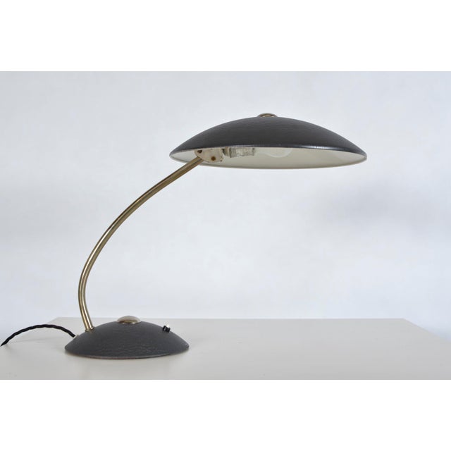 This wonderful desk lamp designed by Christian Dell in the 1960s is a rare find from Kaiser Idell, as It has a textured,...