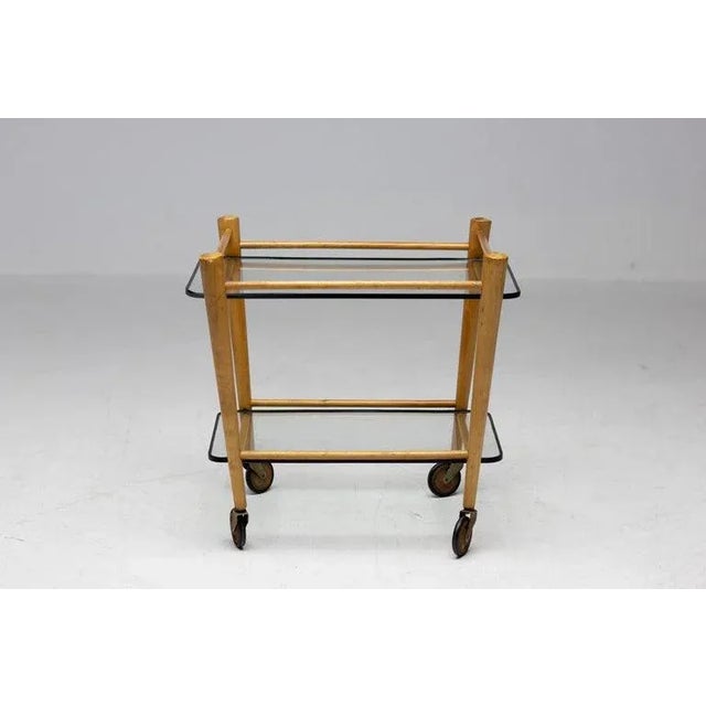 Wonderful little tea cart made in Italy, circa 1950. The piece is still in all original condition. I have official proof...