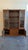 DESCRIPTION: A classic mid century modern hutch by Garrison Furniture Co. featuring a clean walnut profile, glass display...