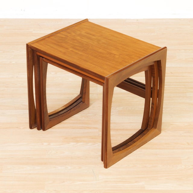 Mid-century set of 'quadrille' nesting tables by VB Wilkins for G Plan. Constructed from teak and afromosia, these quality...