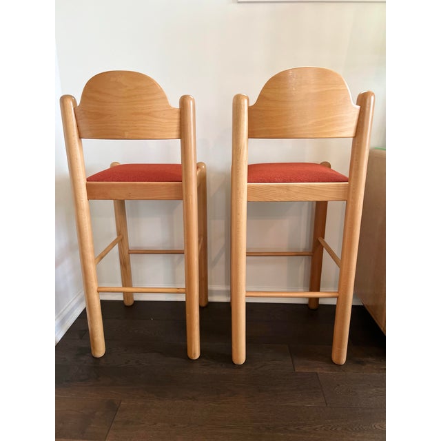 Attributed to Hank Lowenstein for Gordon International, Italy, a striking pair of postmodern counter stools dating to the...
