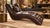A relaxation chaise longue in the 1970s design style, with a fluid and organic s-shaped profile. The seat is fully...