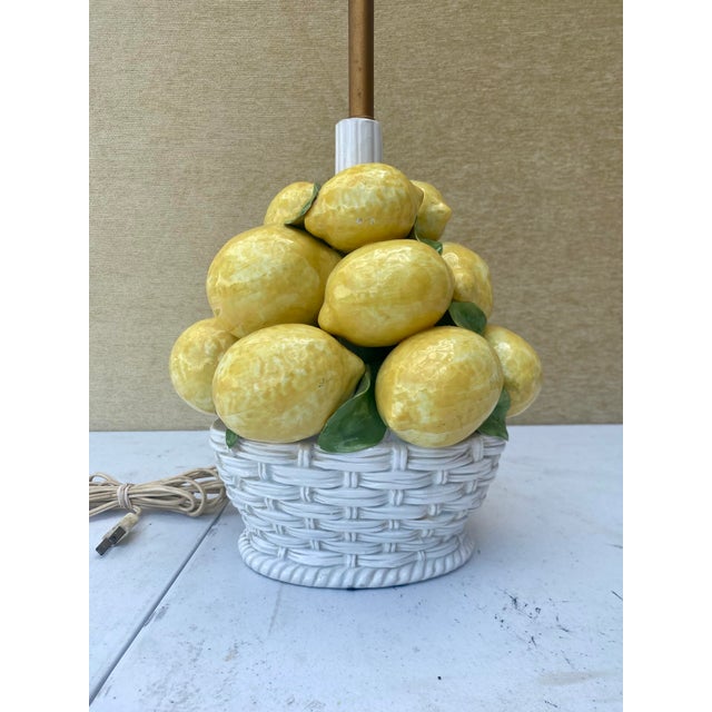 This is a vintage of a lemon and leaves topiary lamp made in the Italian Majolica production style. features intricate...