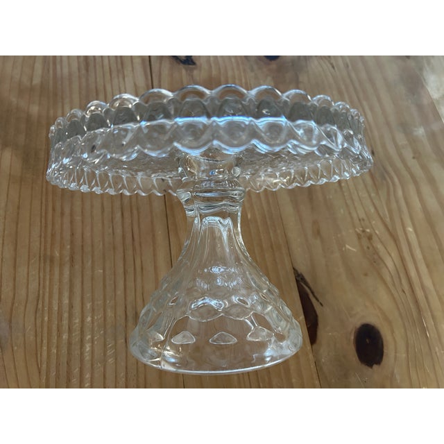 Vintage Fostoria Glass Cake Stand, circa Mid Century, United States. American pattern first introduced in 1900. It became...