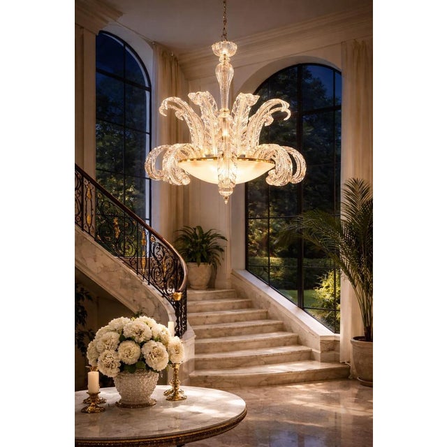 Elegant and rare murano glass chandelier, made of precious hand blown clear glasses. Cleaned and re-wired, in full working...