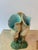 Antique majolica miniature ceramic vase. Features three pale yellow conch shell or floral forms, and a shell pattern at...