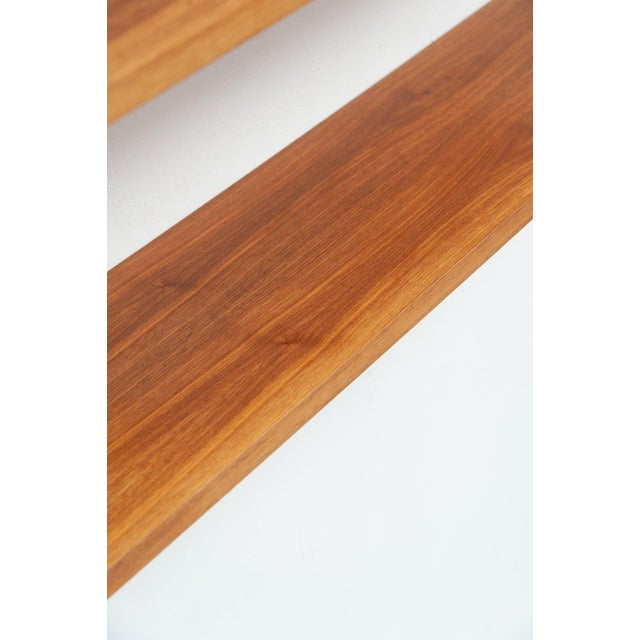 String shelving system with 4 shelves and 2 ladders in walnut Design: Kajsa & Nils "Nisse" Strinning Width 78 cm Height 77...
