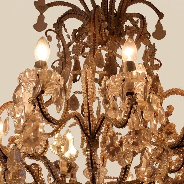 An important French eighteen-light chandelier in the Louis XV style, dating from the late 19th century, circa 1880-1900....