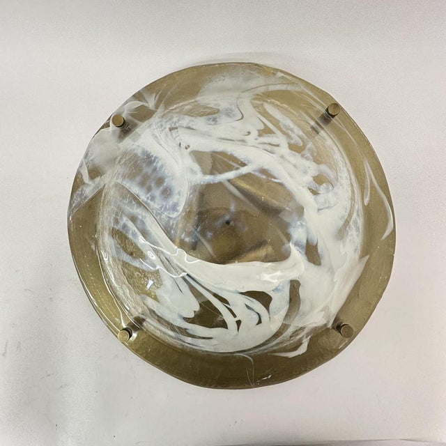 Dimensions: 41.5cm Diameter , 11.5cm Height Material: Glass, metal Color: Gold, White. Up to 250V (Europe/UK Standard).The...