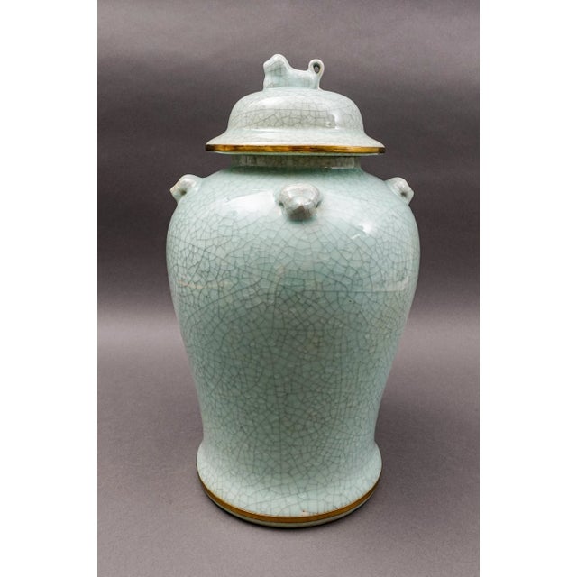 Maitland Smith Celadon Crackle Glazed Porcelain Foo Dogs Large Lidded Ginger Jar. Measures approximately 9" diameter, 12...