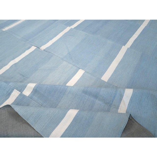 An oversize blue and white Turkish Kilim