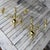 A classic pair of solid brass wall sconces with elegant scroll arms and a timeless Colonial Revival silhouette. Their...
