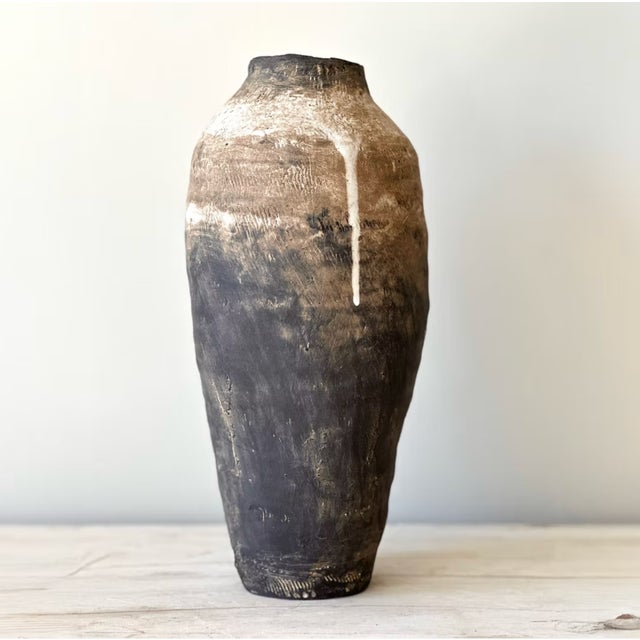 Trent Kendrick VESSEL - TORMENTA stoneware with glaze Tall, narrow, severe — a vessel that stands like weather about to...