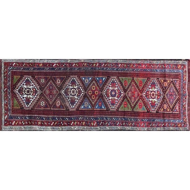 3'5" x 9'10" fabulae antique Persian runner c-1900's, geometric design of medallions with animal features in multi colors,...