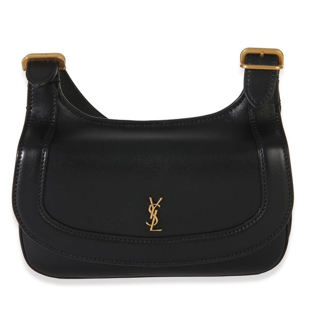 Item #: 154144 Interior Material: Suede Size: Small Features Interior: One slip pocket Dimensions: 7 x 5 x 1.5 in Handbag...