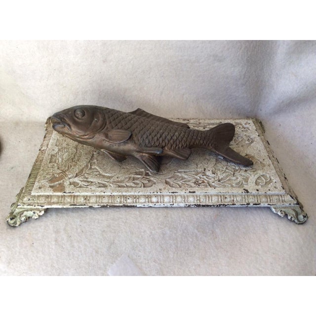 A very unusual Antique (circa 1880s or so) Aesthetic Movement Paperweight. The Paperweight is made of cast iron and is in...