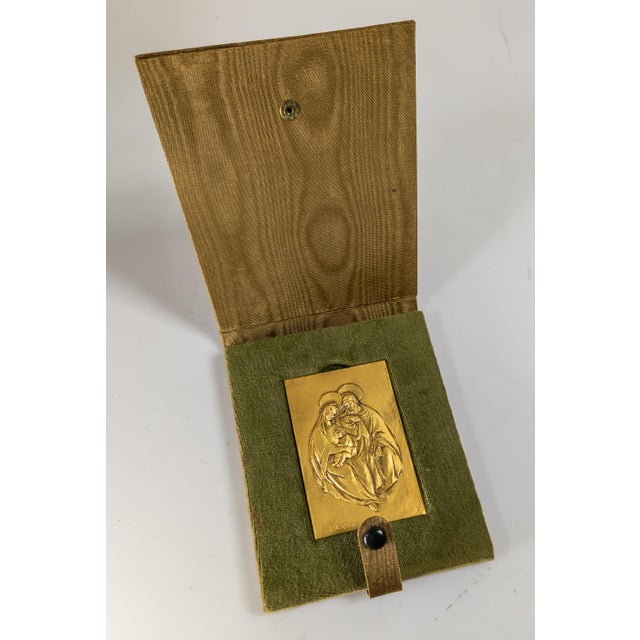 We are selling this nice gilt bronze Plaque by Enrico Manfrini (It. 1917-2004). The bronze features the holy family in low...
