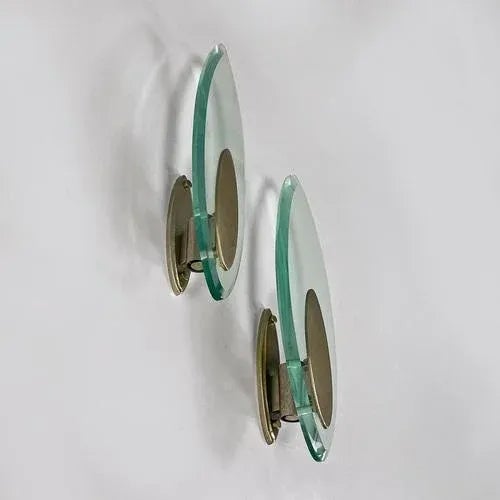 Italian modern glass and brushed steel sconces or wall lamps by lumi milano, 1970s. Pair of glass appliques or wall lamps,...