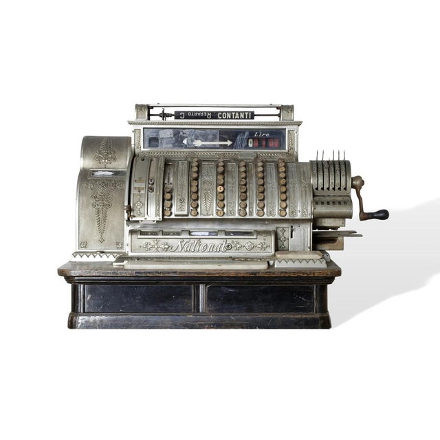 Beautiful original vintage National cash register in Lire. The body in nickel-plated bronze and chiseled with intricate...