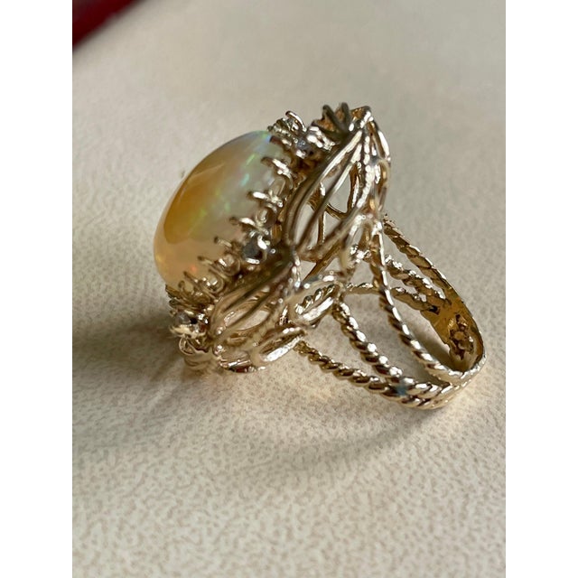 Pop Art 15 Carat Oval Shape Ethiopian Opal Cocktail Ring 14 Karat Yellow Gold Solid Ring For Sale - Image 3 of 18